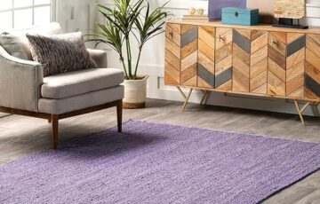 Handwoven purple jute rug with a natural texture, perfect for adding a cozy and eco-friendly touch to any living space